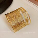 Gold Coil Statement Bracelet