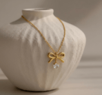 Gold Bow Necklace with Heart-Shaped Diamond Pendant