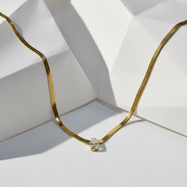 Gold-Plated Snake Chain Necklace with Teardrop Crystal Pendant