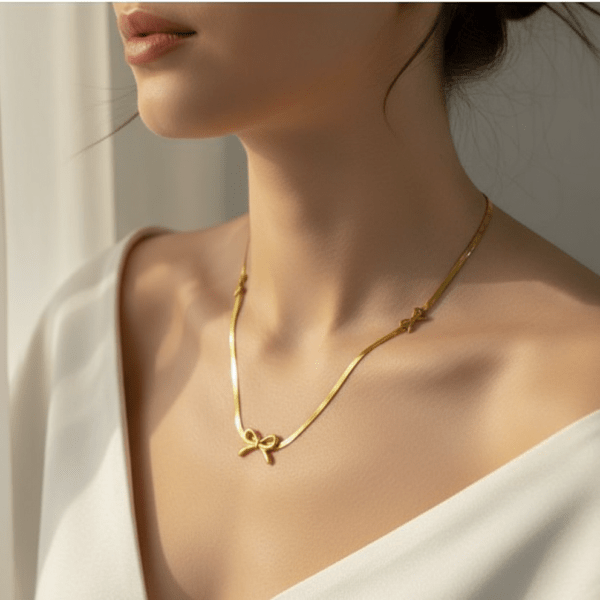 Gold Bow-Tie Snake Chain Necklace