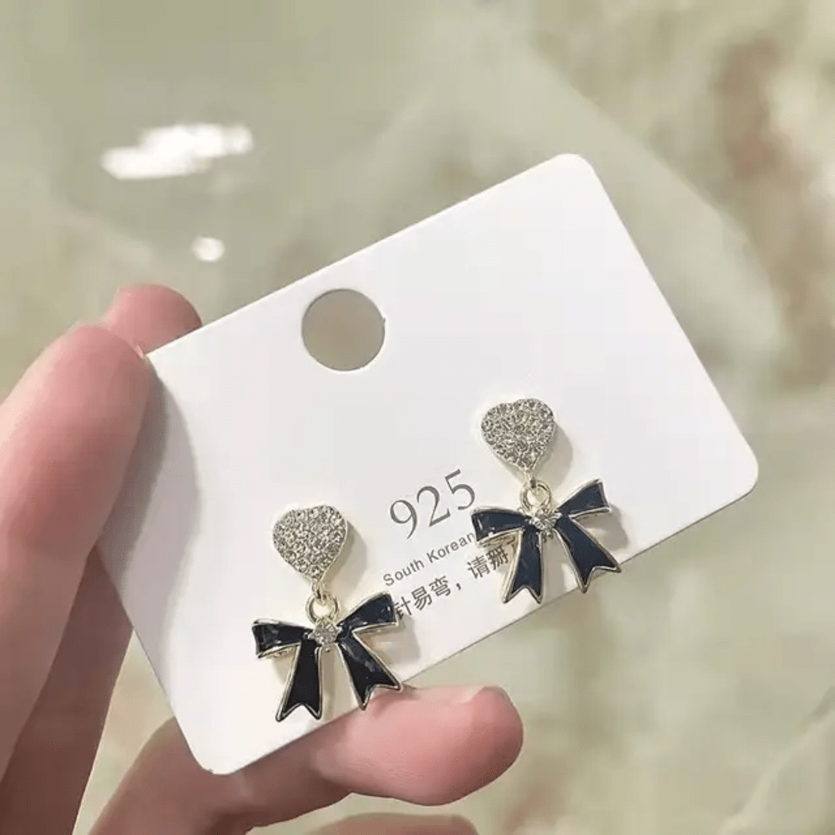 Elegant Heart & Bow Black Drop Earrings - Image 3