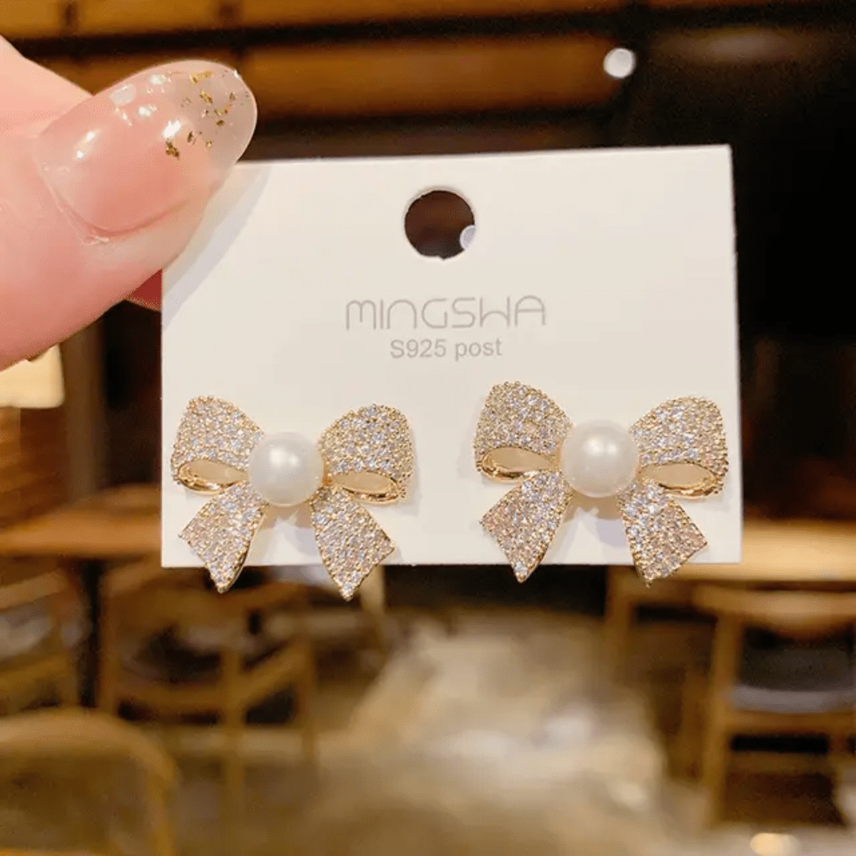 Elegant Pearl Bow Stud Earrings - Image 2