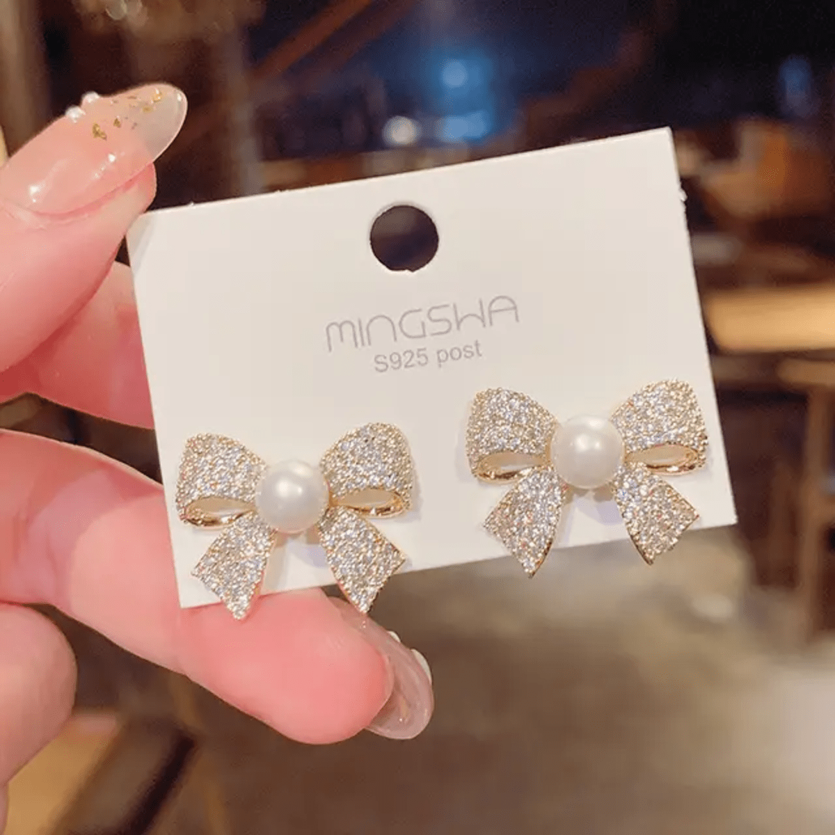 Elegant Pearl Bow Stud Earrings - Image 3