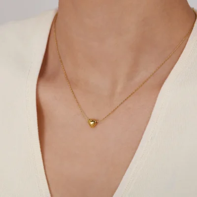 Gold heart pendant necklace with rounded 3D charm on delicate chain