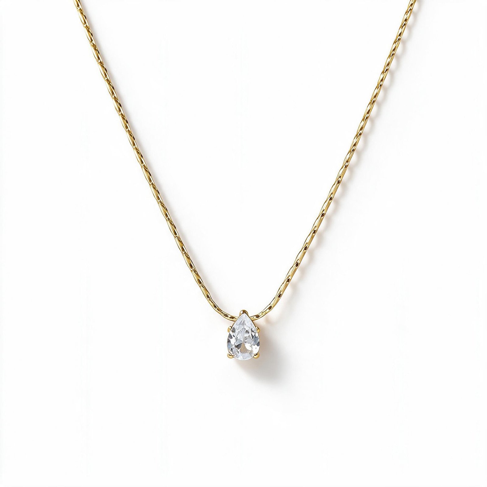 Dainty gold-tone necklace with teardrop crystal pendant