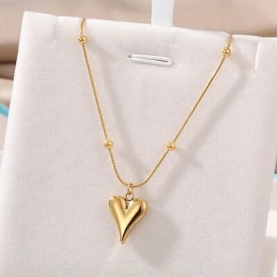 Gold satellite chain necklace with elongated heart charm pendant