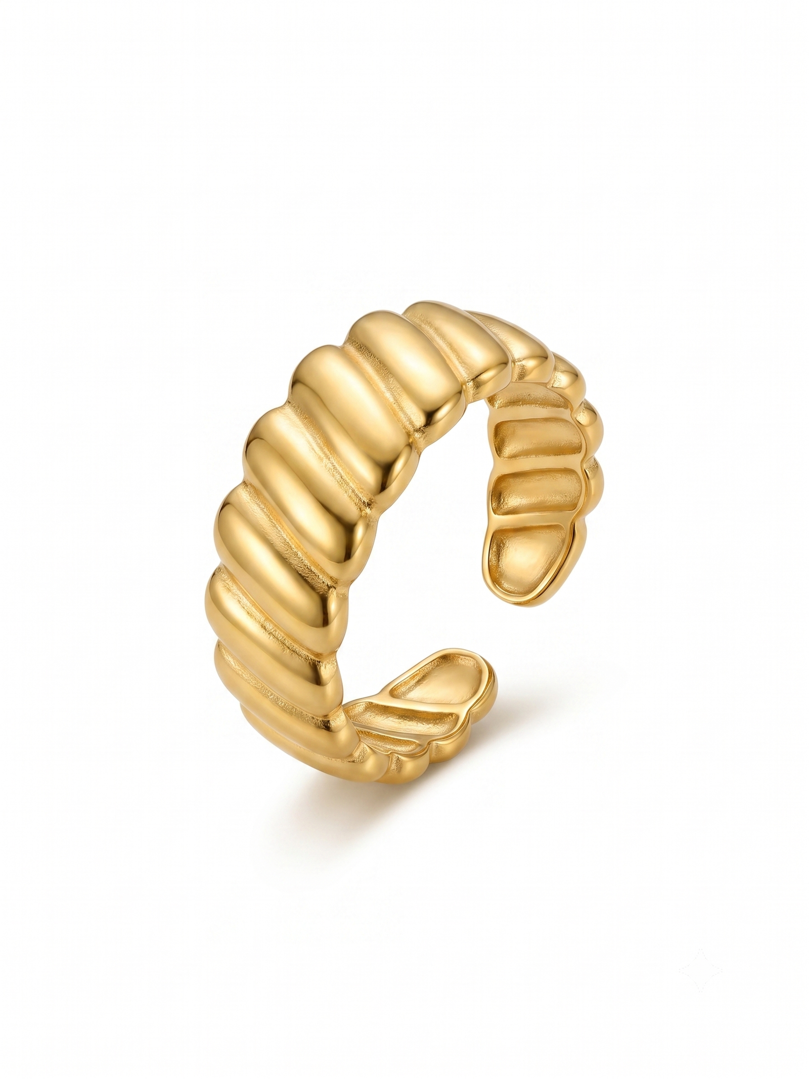 Chunky gold croissant ring with ribbed twist design on white background