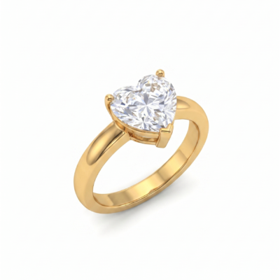 Gold heart-shaped solitaire ring with chunky band on white background